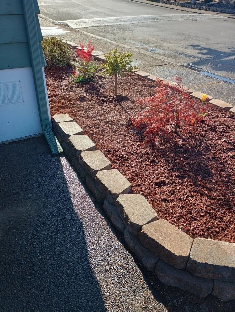 Custom landscape installation for outdoor upgrades in Eugene, OR by Rick’s Lawn Care Services