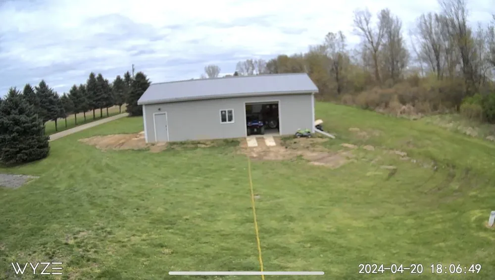 Custom garden landscaping for residential properties in Fowlerville, MI by Rick's Outdoor Services