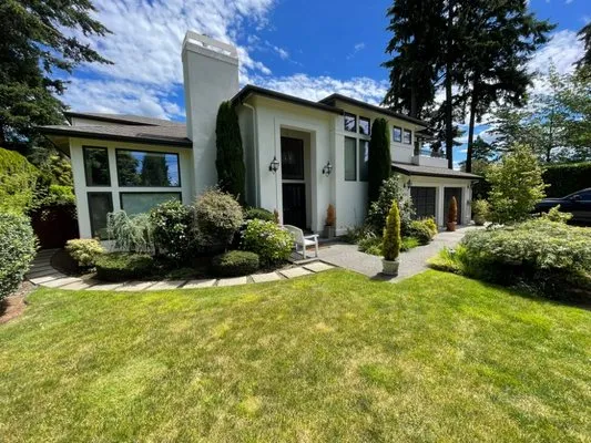 Ricmar Landscaping and Excavations Logo