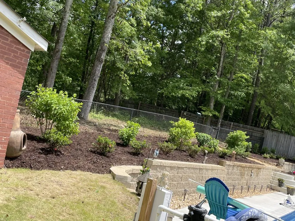 Local garden landscaping with custom design in Powder Springs, GA by Rid Property Services