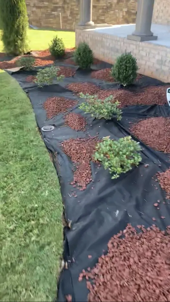 Custom landscaping services for year-round maintenance in Powder Springs, GA by Rid Property Services