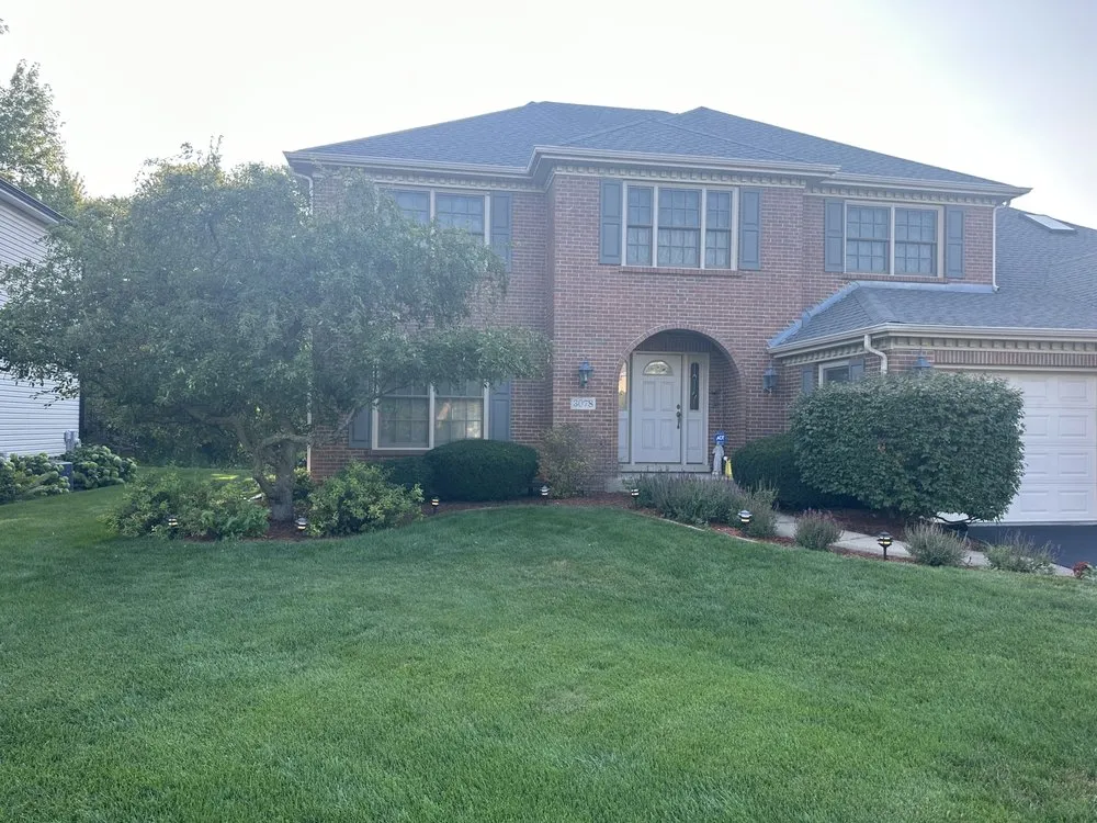Custom landscape design for homes in Batavia, IL by Riddle Lawn Care & Pressure Washing