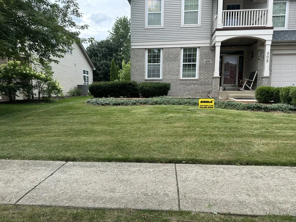 Professional yard cleanup service for year-round maintenance in Batavia, IL by Riddle Lawn Care & Pressure Washing