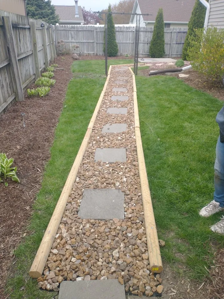 Expert lawn mowing service in Champaign, IL by Riggs Renewal