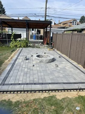 Rigoberto's Landscaping & Brick Paving Logo