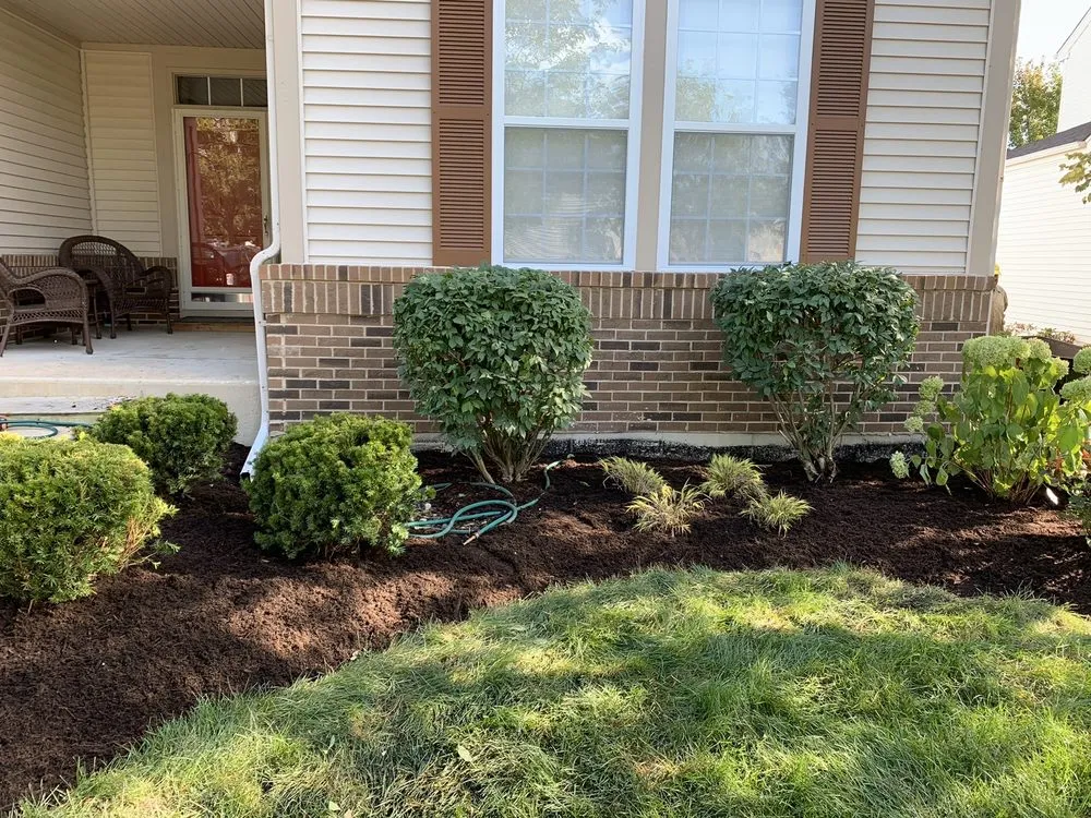 Trusted garden landscaping with custom design in Aurora, IL by Riley's Lawn & Snow