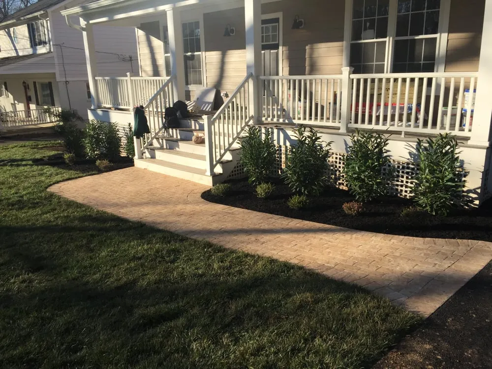 Custom yard cleanup service for year-round maintenance in Arlington, VA by Rimble Landscaping