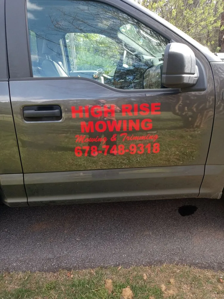 Professional landscape installation in Locust Grove, GA by Rise High Mowing