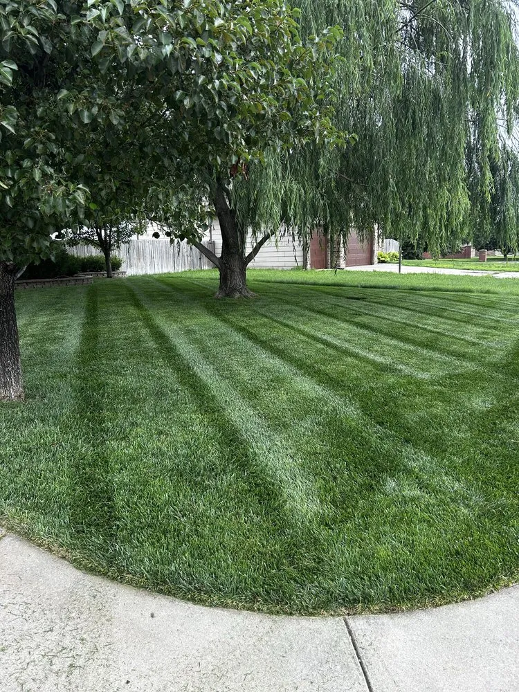 Reliable lawn mowing service for homes in Wichita, KS by Rising Lawn Care