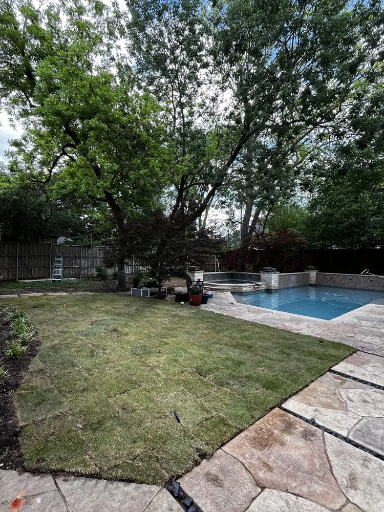 Professional landscape installation in Garland, TX by River Oaks Landscaping