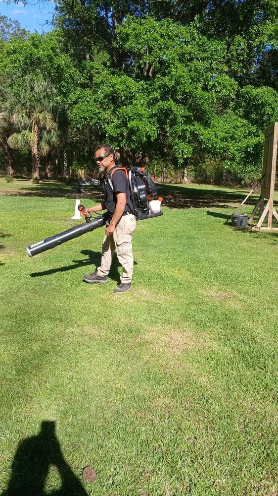 Expert lawn mowing service in Carriere, MS by River Rose Lawncare