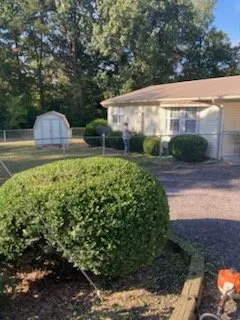 Custom outdoor landscaping with custom design in Russellville, AR by River Valley Lawn Services