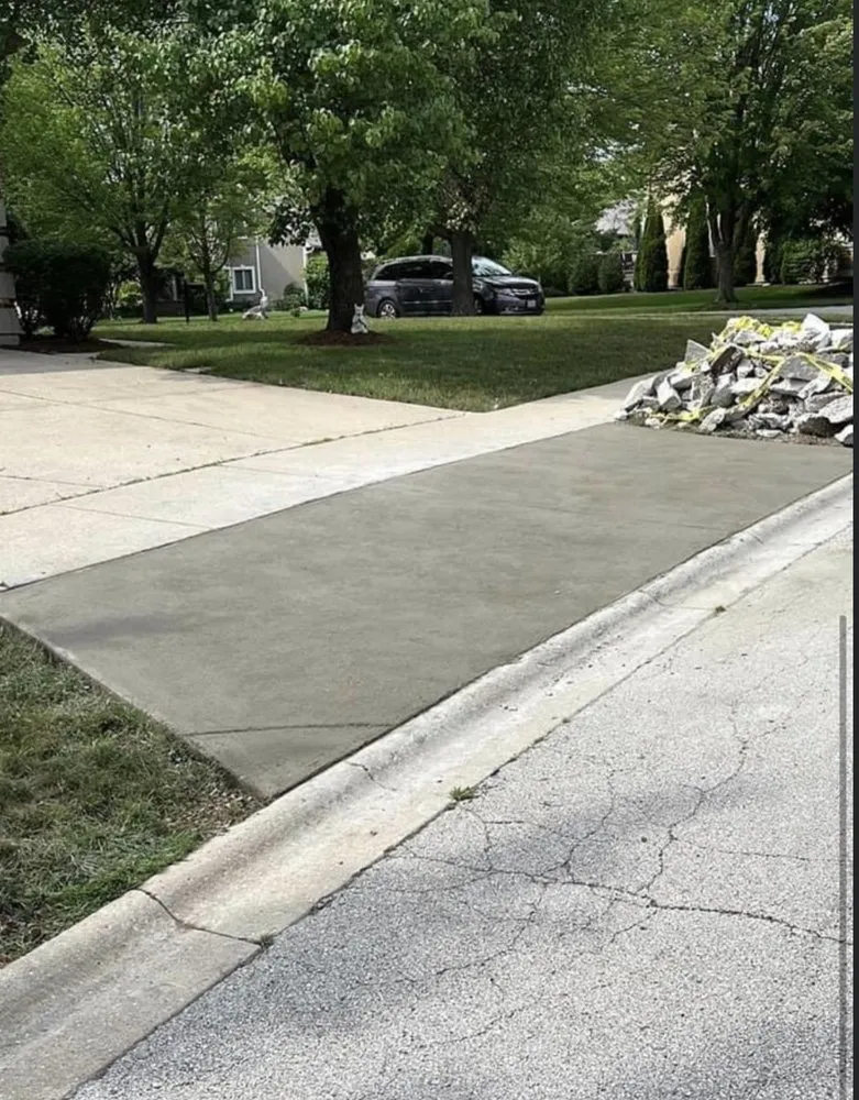 Professional landscape installation with custom design in Round Lake Beach, IL by Rivera Concrete Paving