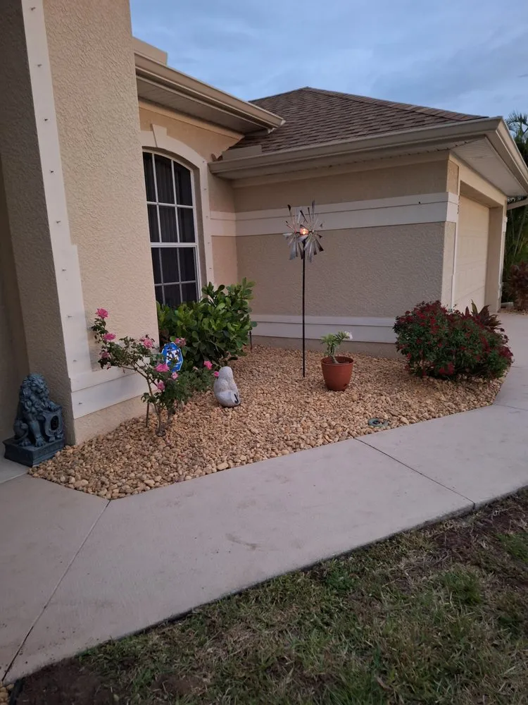 Custom outdoor landscaping in Lehigh Acres, FL by Rivera F Lawn Service