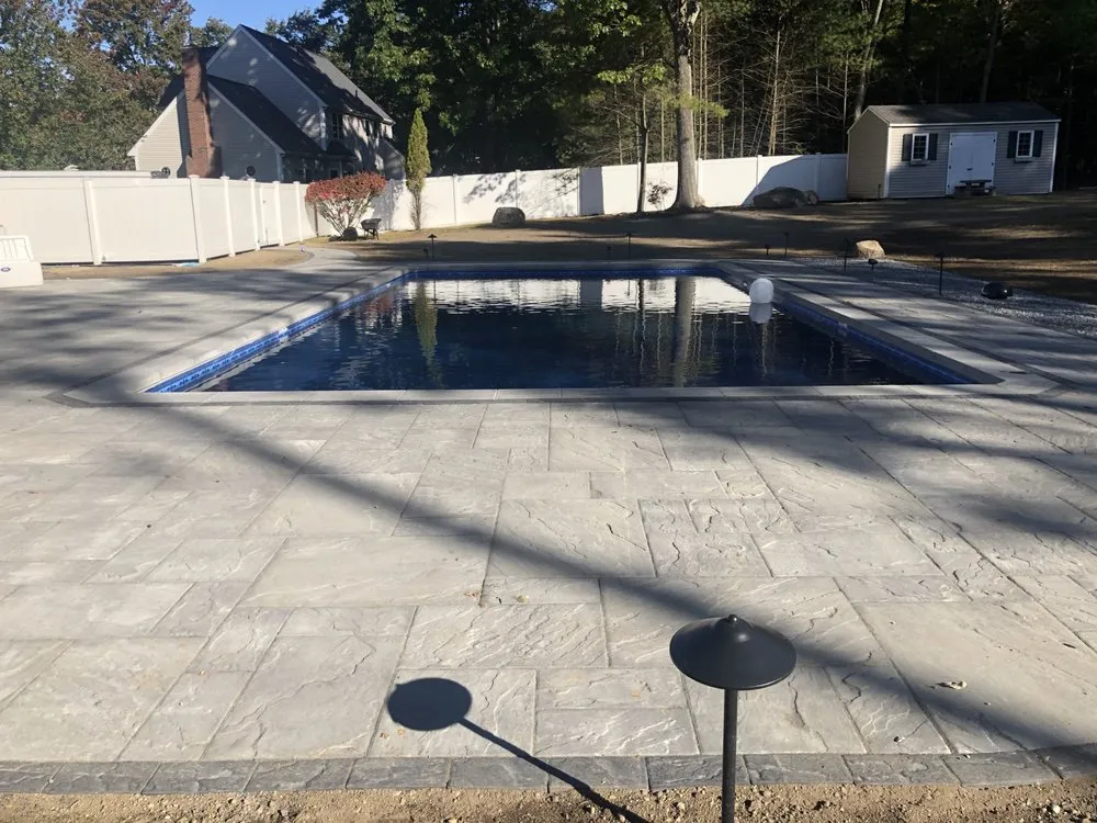 Local lawn care service with custom design across Concord, MA - Riverfront Landscape