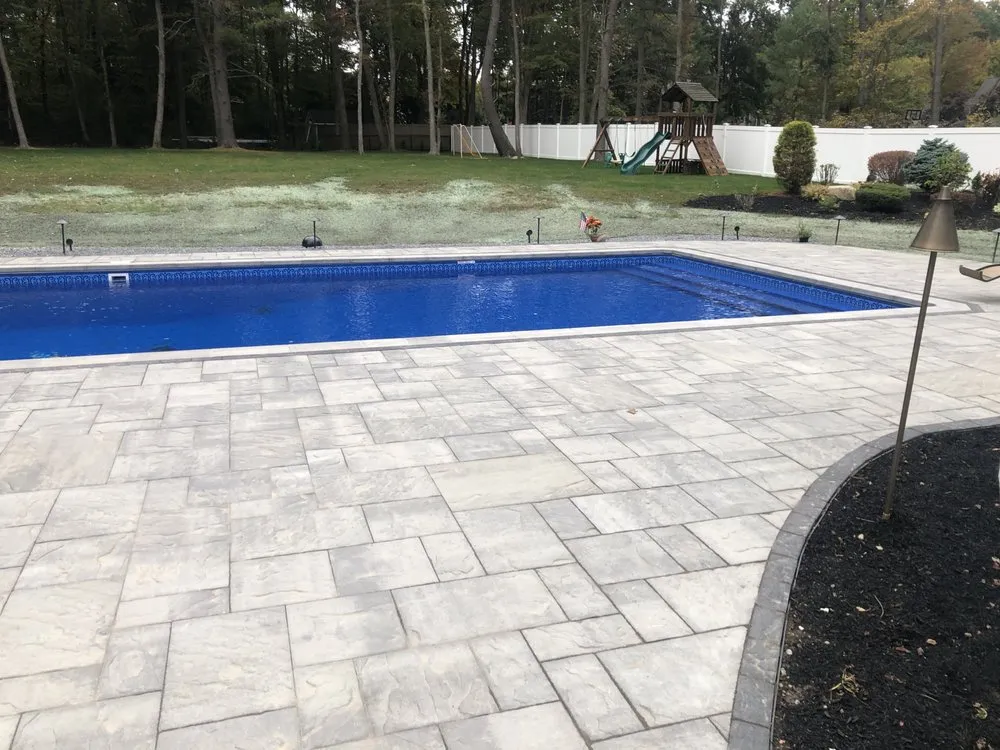 Custom residential landscaping for year-round maintenance across Concord, MA - Riverfront Landscape