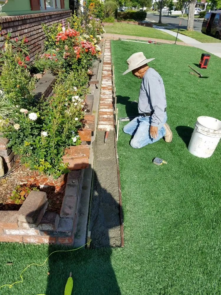 Expert lawn mowing service for residential properties in Long Beach, CA by River's Contractors
