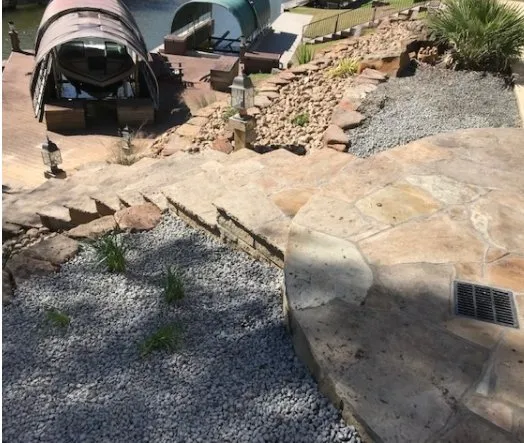 Affordable lawn mowing service with custom design in Conroe, TX by Riverside Lawn & Landscaping