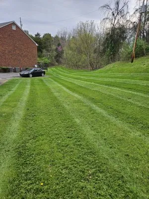 Riverside lawn care and maintenance Logo