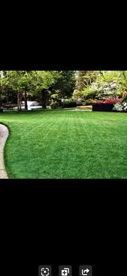 Riverside Lawncare And Design Logo