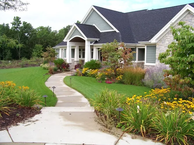 Affordable lawn mowing service with custom design in Rockford, MI by Rivertown Landscapes