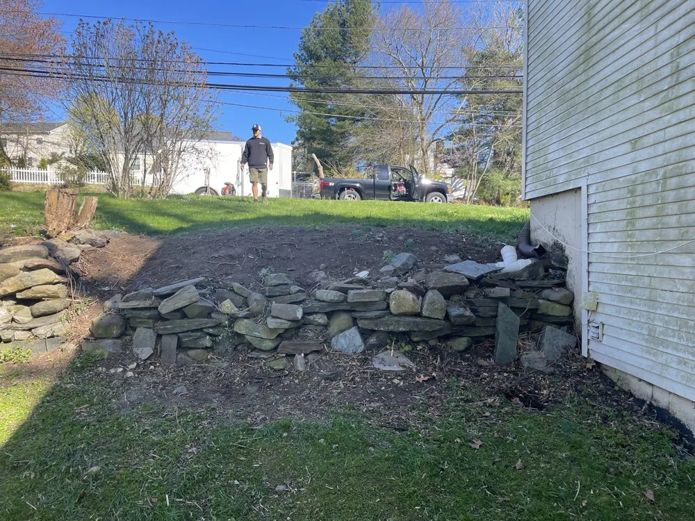 Expert landscaping services for residential properties in Cheshire, CT by Riverwood Groundskeeping