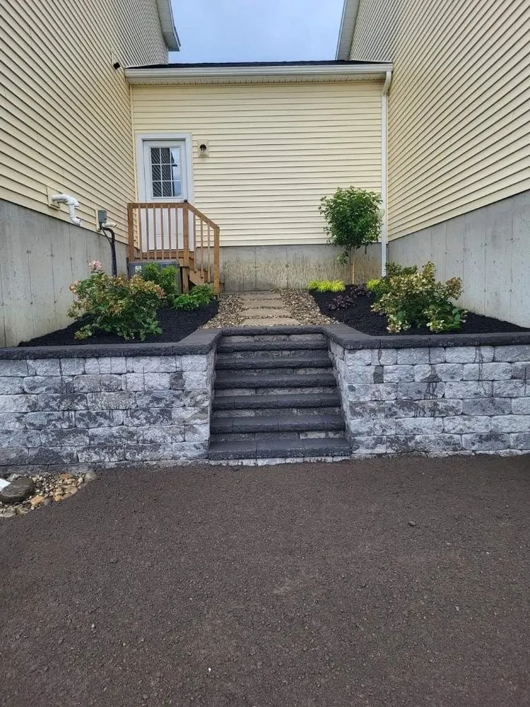 Affordable landscaping services for residential properties in Troy, NY by R&J Landscape
