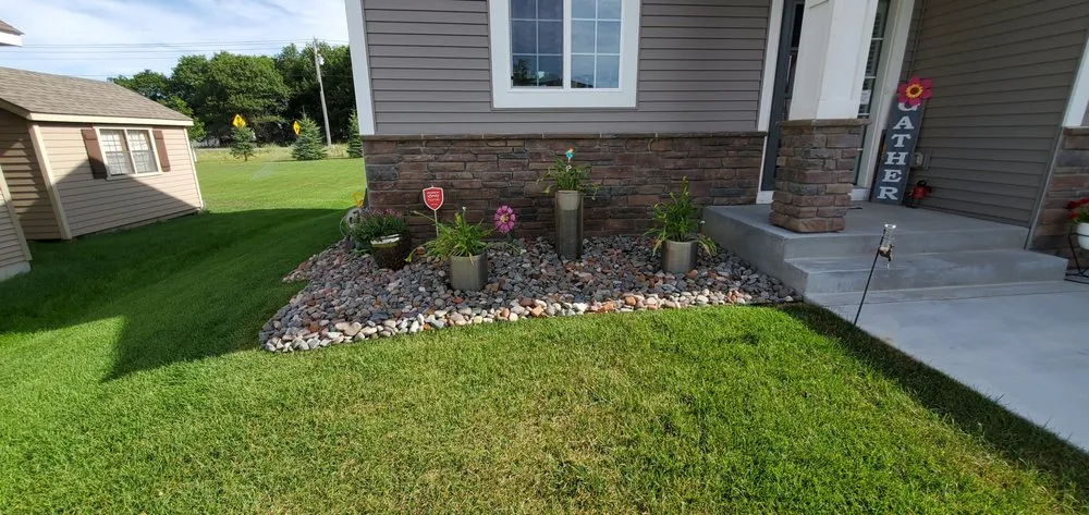 Affordable lawn mowing service for outdoor upgrades in Andover, MN by RJ Landscaping