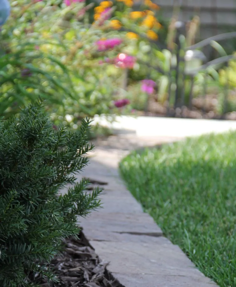 Custom landscape design in Waukee, IA by RJ Lawn & Landscape