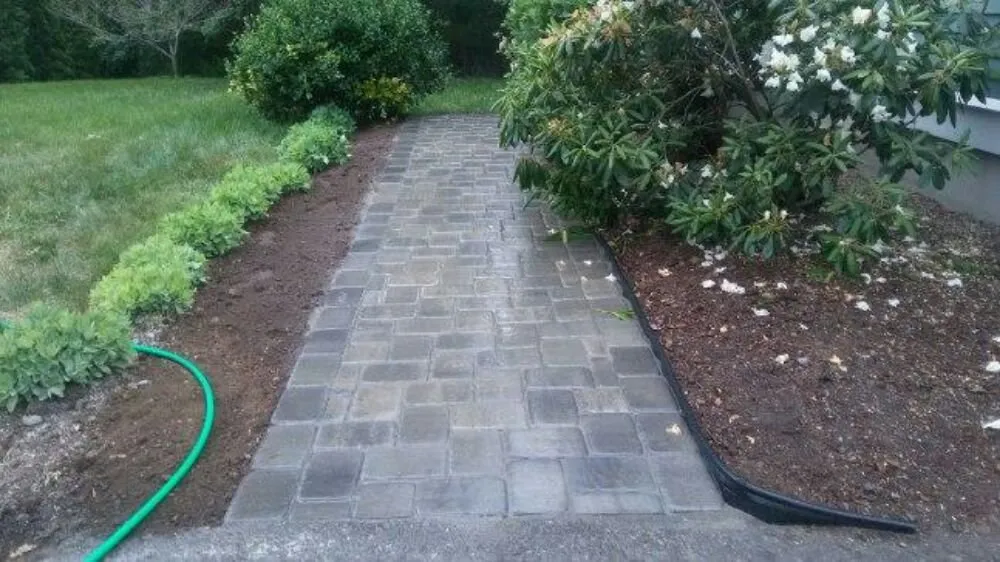 Custom landscape design in Amesbury, MA by RJM Construction