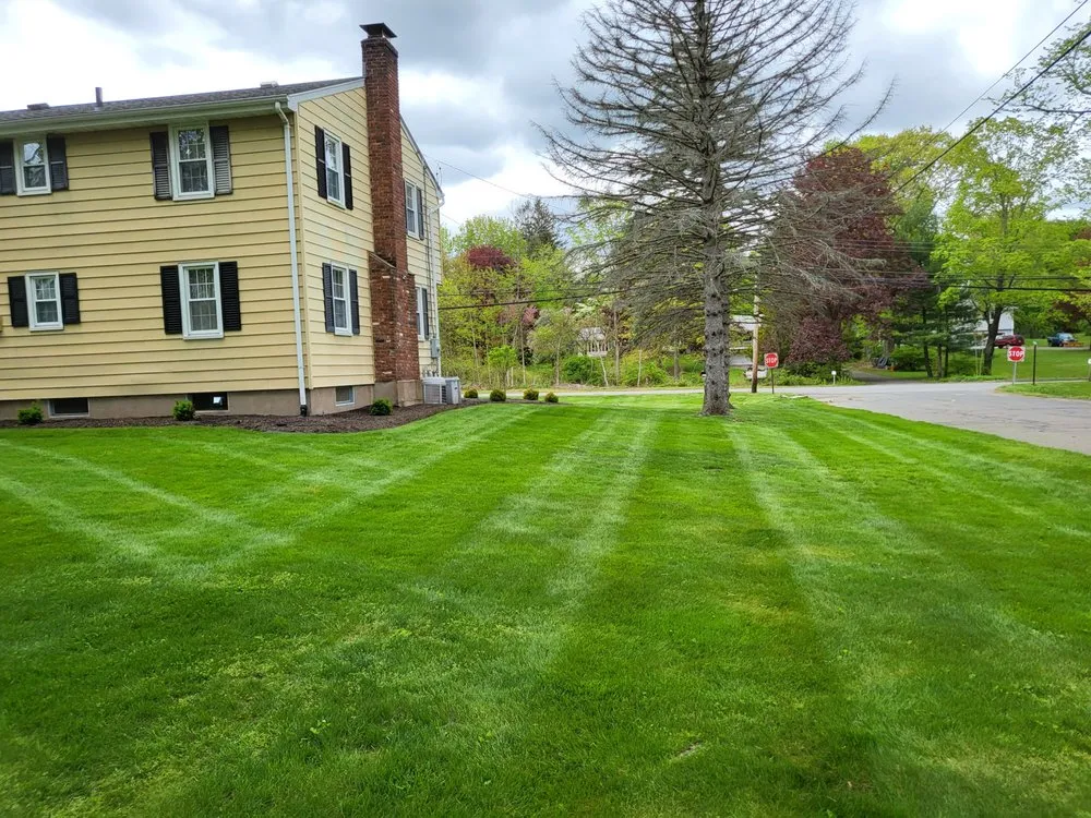 Custom lawn mowing service for outdoor upgrades in Middletown, CT by RJR Landscaping