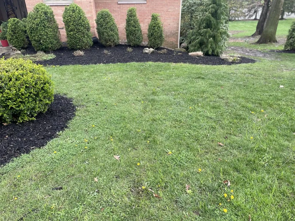 Custom lawn mowing service for outdoor upgrades in Dover, OH by Rj's Lawn & Landscaping