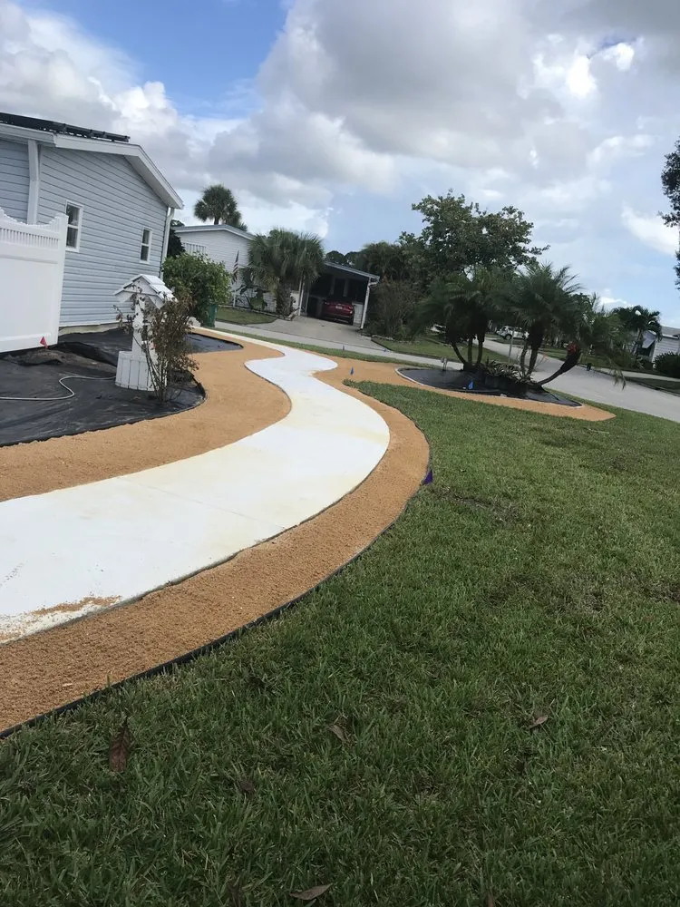 Local lawn mowing service with custom design across Melbourne Village, FL - RLA Professional Touch Landscaping
