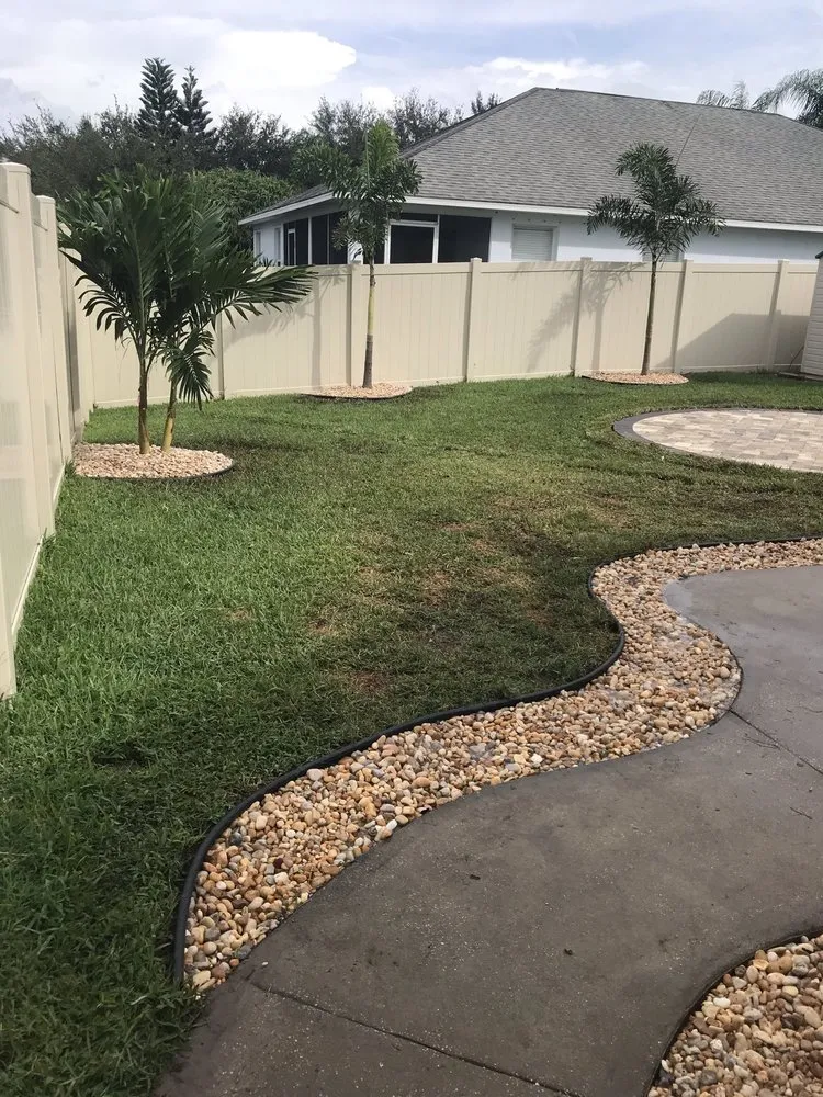 Reliable lawn care service for homes in Melbourne Village, FL by RLA Professional Touch Landscaping