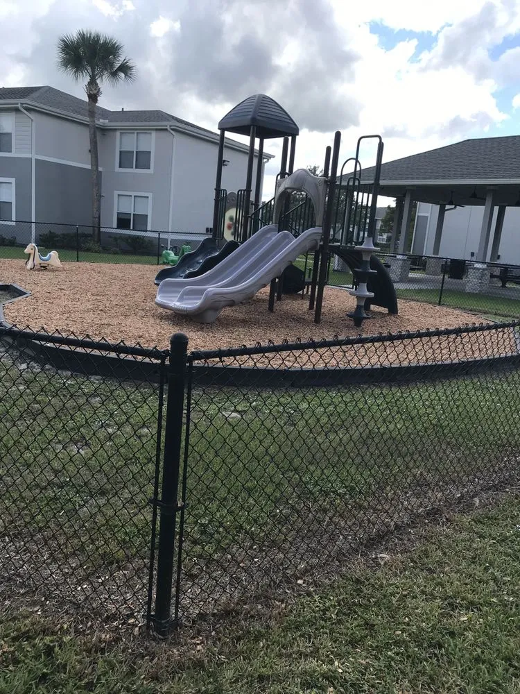 Affordable yard maintenance for residential properties across Melbourne Village, FL - RLA Professional Touch Landscaping