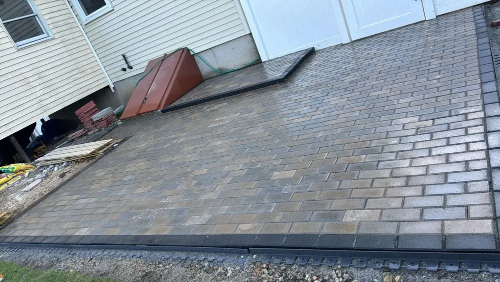 Trusted lawn mowing service with custom design in Waltham, MA by RM Affordable Landscaping