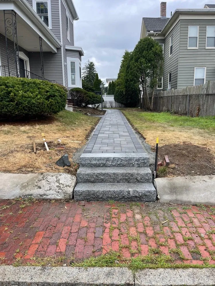 Expert lawn care service for year-round maintenance across Woburn, MA - R&M Landscaping And Construction