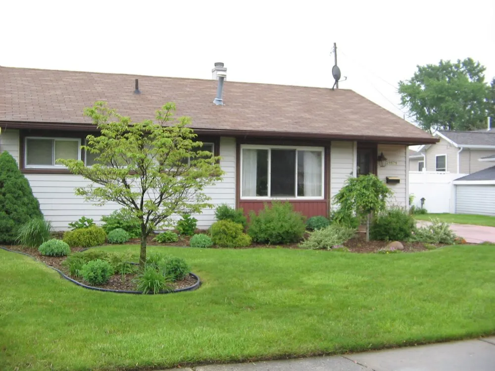 Expert lawn care service for homes in Dearborn Heights, MI by R&M Property Services