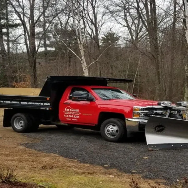 Professional lawn mowing service with custom design across Brimfield, MA - RMD Services