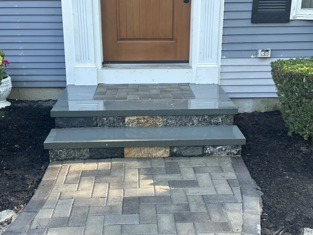 Custom landscape design with custom design in Barnstable, MA by Rob Masonry and Landscaping
