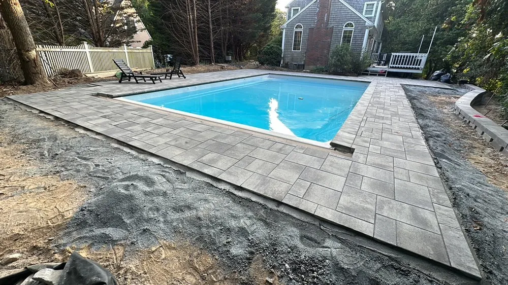 Expert lawn mowing service with custom design in Barnstable, MA by Rob Masonry and Landscaping