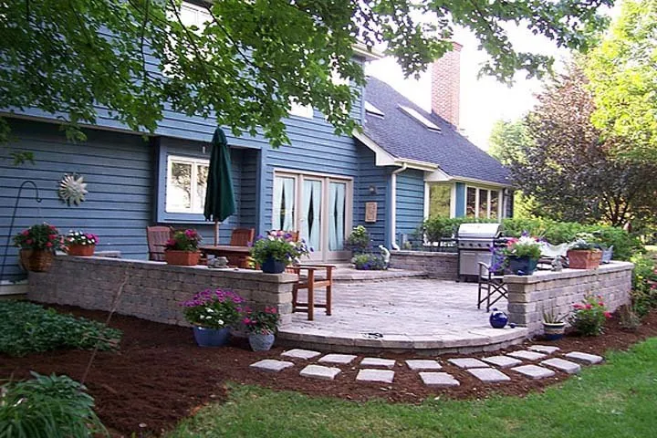 Custom yard maintenance for year-round maintenance in De Motte, IN by Rob Rocks