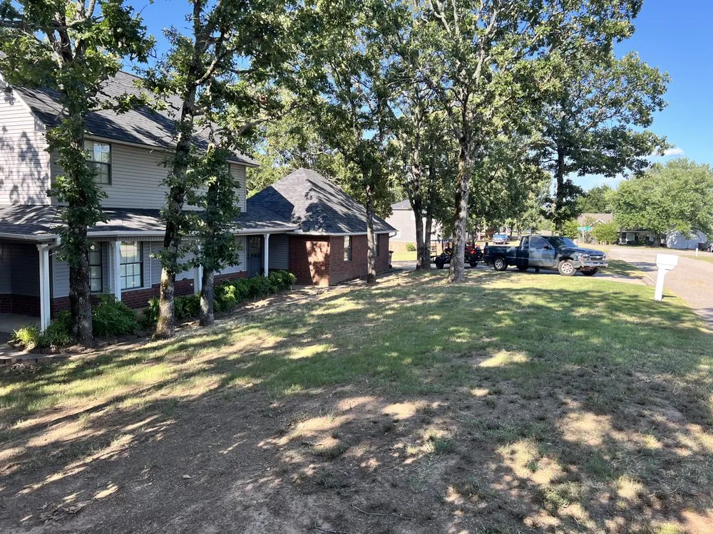 Expert yard maintenance with custom design across Fort Smith, AR - Robbins Lawn Care Services
