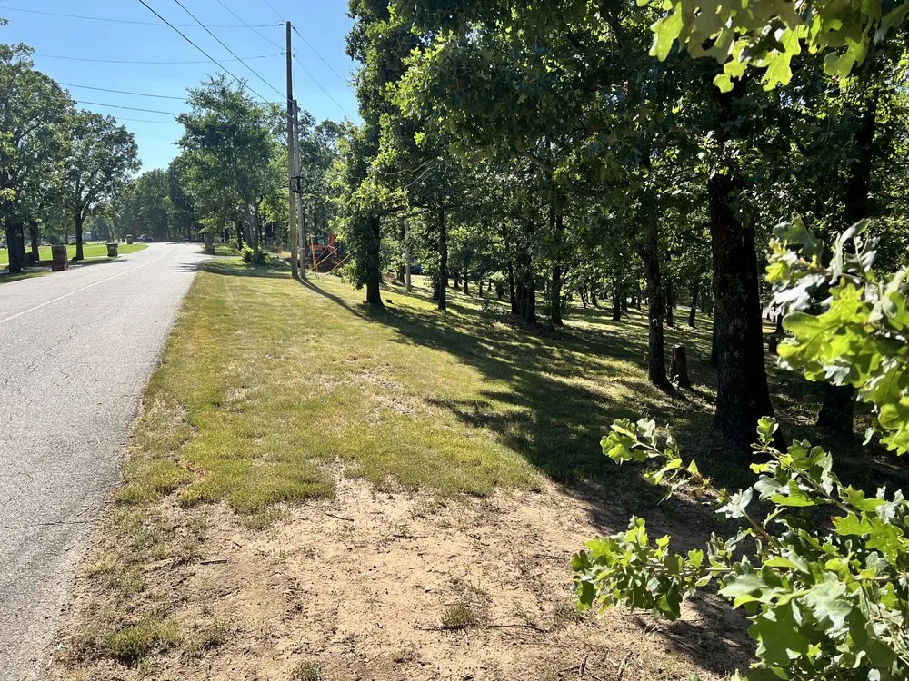 Professional outdoor landscaping for residential properties in Fort Smith, AR by Robbins Lawn Care Services