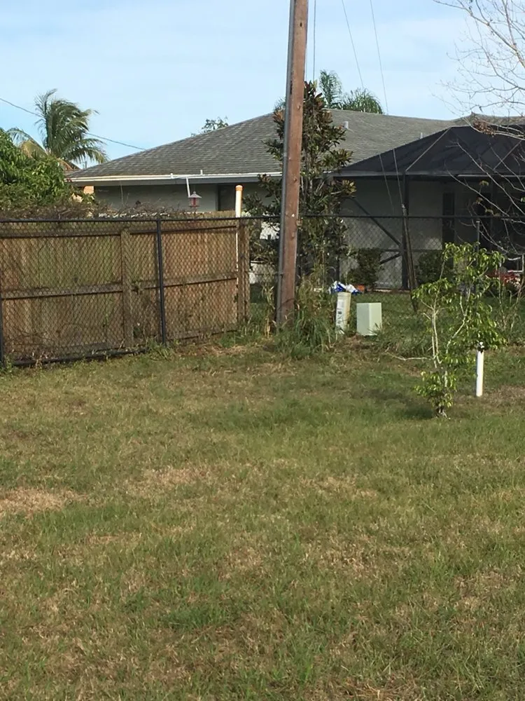 Professional lawn mowing service for homes in Vero Beach, FL by Robbins Pro Lawn Service