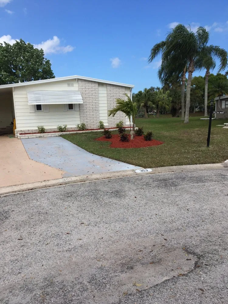 Professional garden landscaping for beautiful yards in Vero Beach, FL by Robbins Pro Lawn Service
