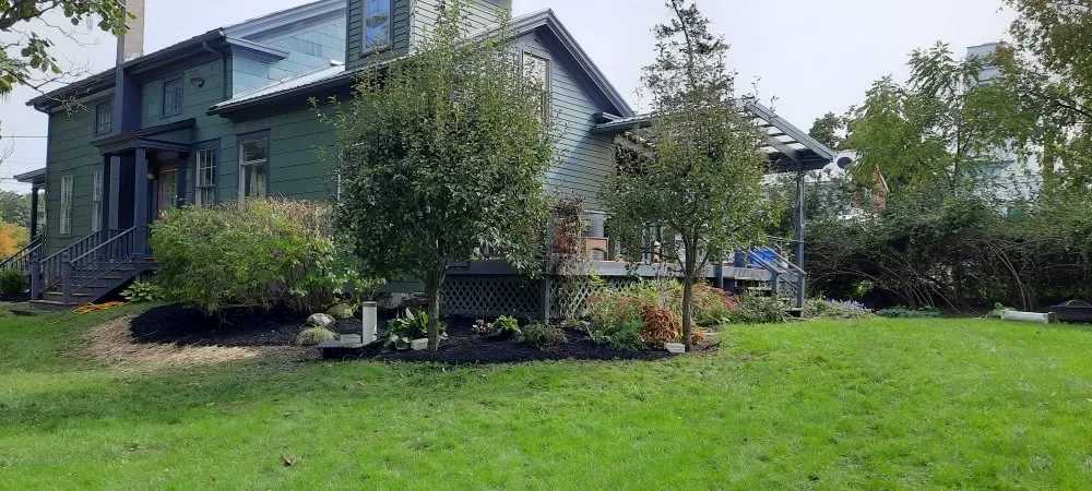 Custom landscape installation for homes across Trumansburg, NY - Robbins Property Management