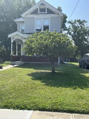 Robert Castro Lawn Service Logo