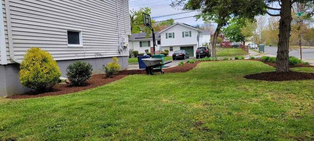 Custom lawn mowing service for year-round maintenance across Watertown, MA - Roberto Affordable Land & Tree Service