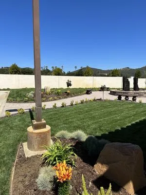 Roberto Landscaping and Tree Service Logo